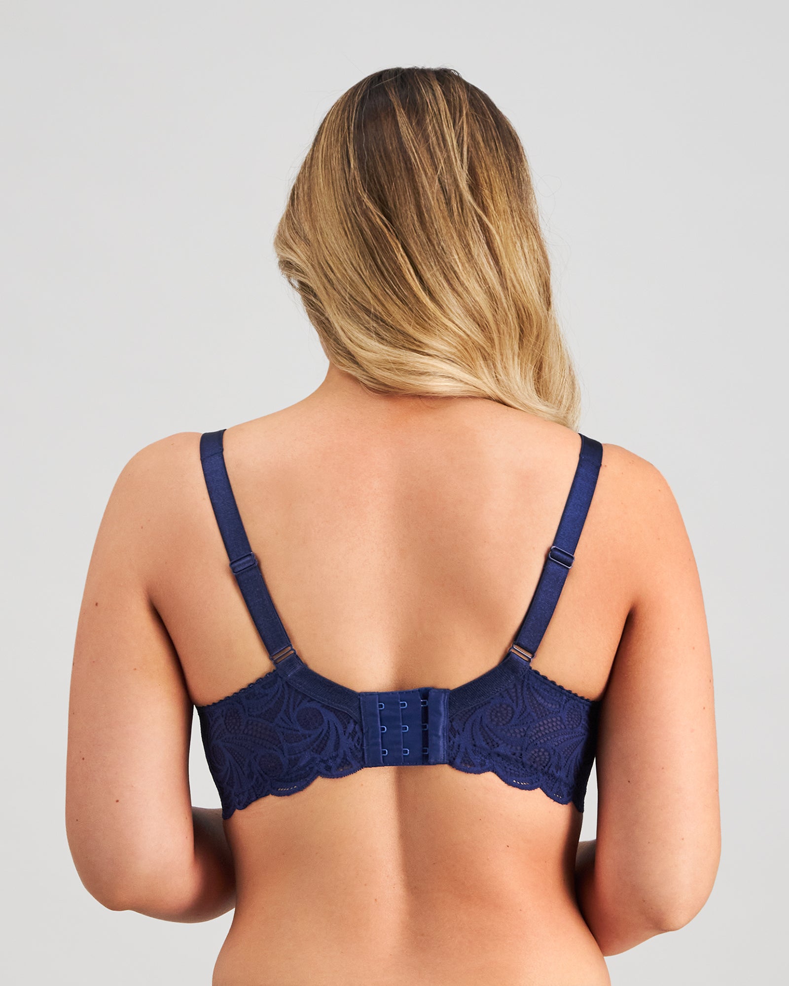 Model wears Lace Perfect Contour Bra in Medieval Blue. On body back view