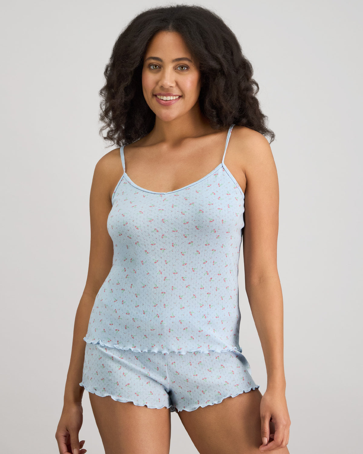 Model wears Smoothie Cami & Short Set in SKYWAY. On body front view