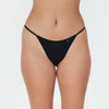 Model wears Clemence Thong in BLACK. On body front view