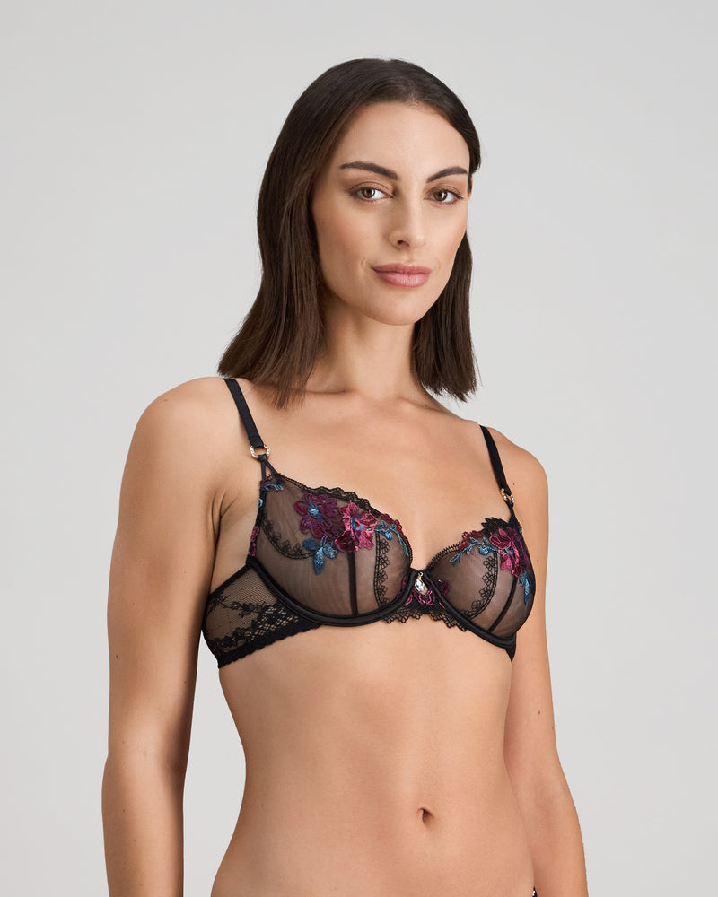 Model wears Niara Underwire Bra in BLACK/BEAUJOLAIS. On body side view
