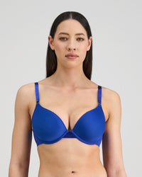 Model wears Plunge Perfect Contour Bra in DAZZLING BLUE. On body front view