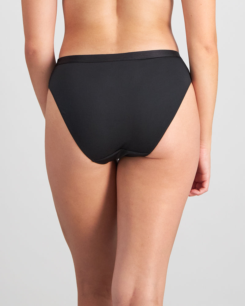 Model wears Selene Bikini in BLACK. On body back view