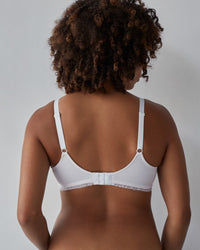 Model wears Elodie Maternity Bra in CRADLE PINK STRIPE. On body back view