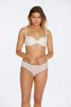 Model wears Rose Radiance Full Brief in WHITE. On body front view