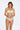 Model wears Rose Radiance Full Brief in WHITE. On body front view