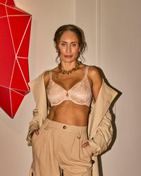 Model wears Manifest Underwire Bra in LATTE. On body side view