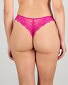 Model wears My Fit Lace Thong in FANTASY FUCHSIA. On body back view