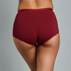 Model wears Body Cotton Full Brief Twin Pack in RHUBARB/LINEN. On body front view