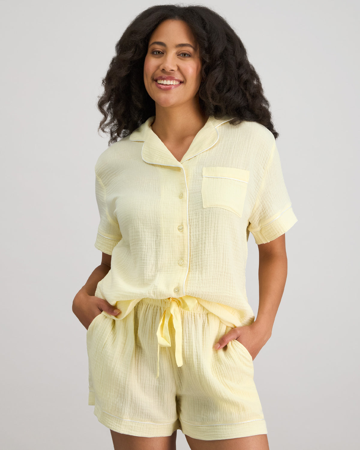 Model wears Bonbon Short Pj Set in TRANSPARENT YELLOW. On body front view
