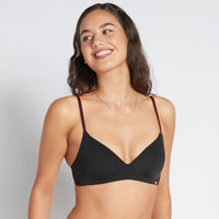Model wears Hold Me Wire Free Bra in BLACK/NEON. On body front view