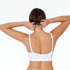 Model wears Castaspell Contour Long Line Bra in WHITE. On body back view