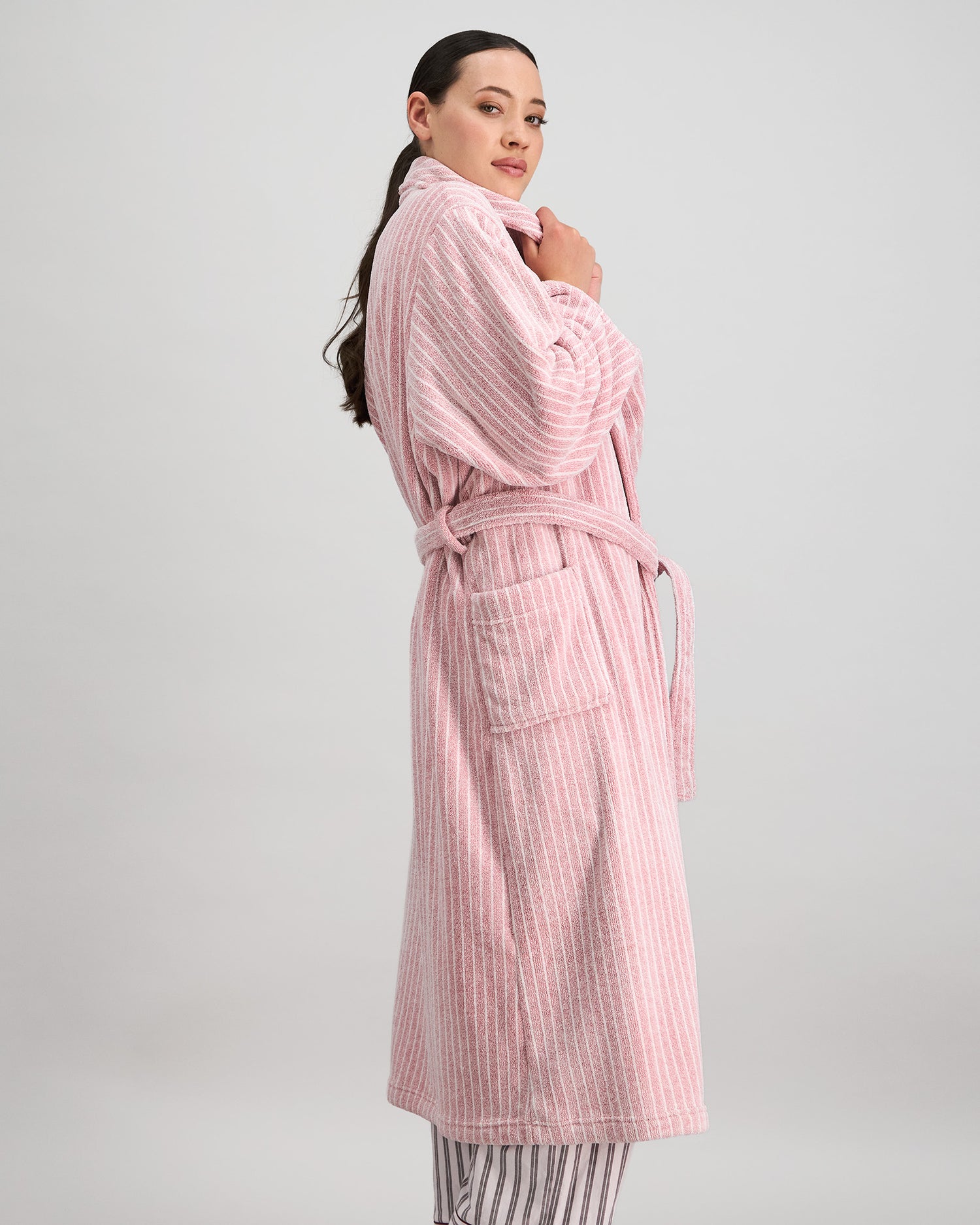 Model wears Marbella Robe in PINK MARL STRIPE. On body side view