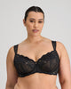 Model wears Midnight Express Underwire Bra in BLACK. On body front view