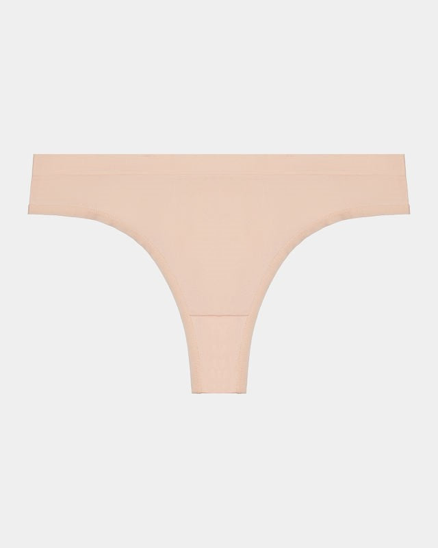Seamless Thong in LATTE. Flat lay front view