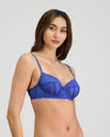 Model wears Sofia Underwire Bra in DAZZLING BLUE. On body side view