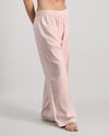 Model wears Cosy Flannel Long PJ Pant in ROSE MINI GINGHAM. On body side view