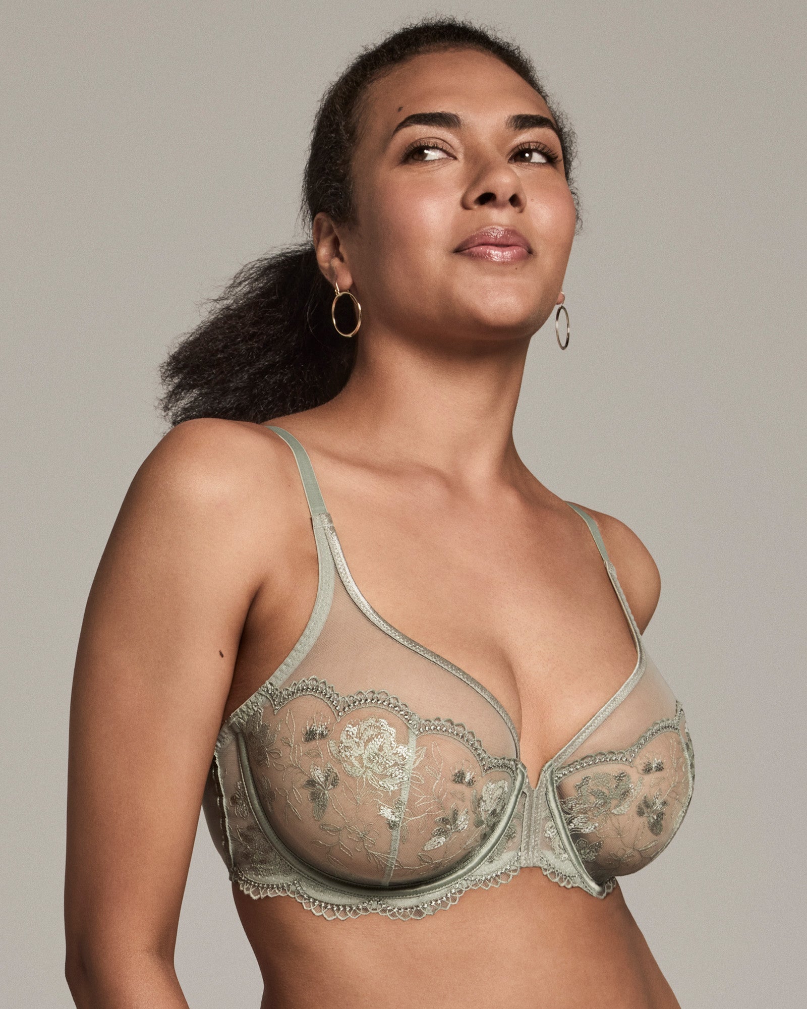 Model wears Romilly Underwire Bra in ICEBERG GREEN. On body side view