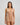 Model wears Flirt In Paradise Babydoll in SUGAR. On body front view