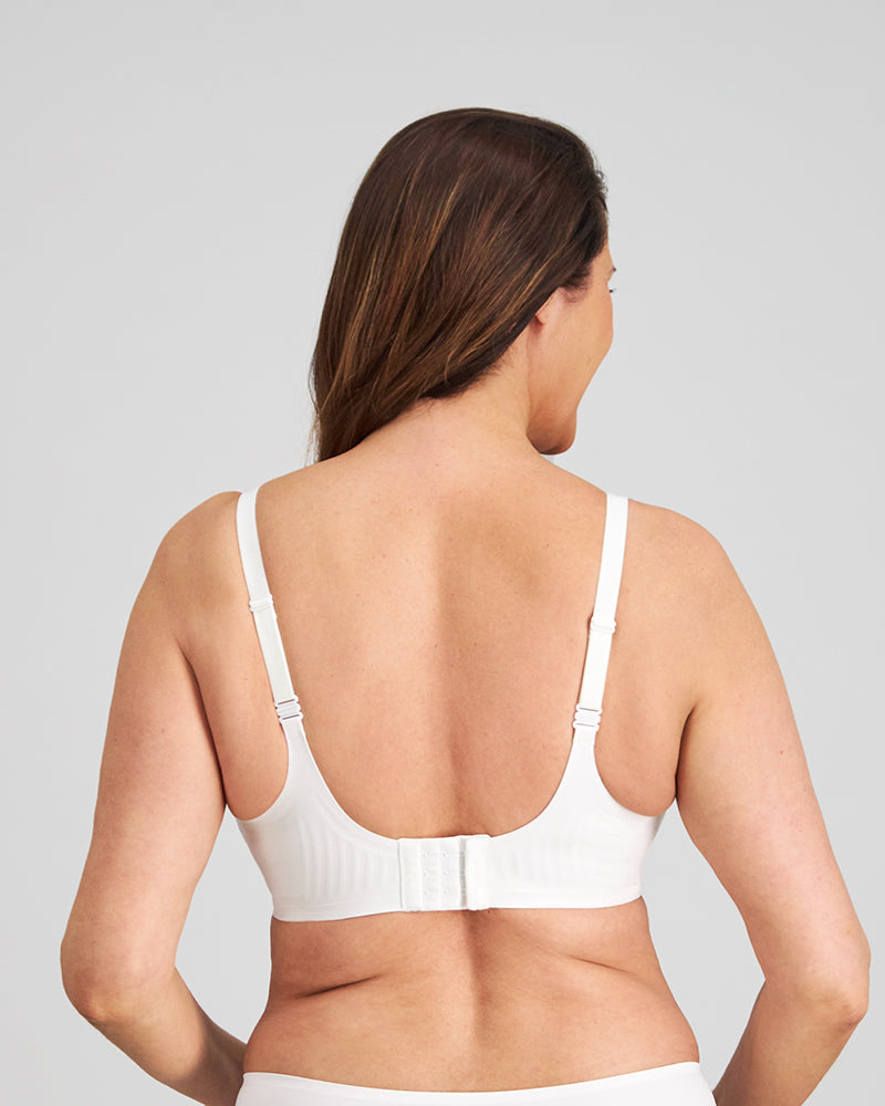 Model wears Comfit Collection Contour Bra in WHITE. On body back view