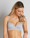 Model wears Simply Seamless Contour Bra in LIGHT GREY MARLE. On body front view