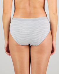 Model wears Simply Seamless Boyshort in GREY MARL/WHITE STRIPE. On body back view