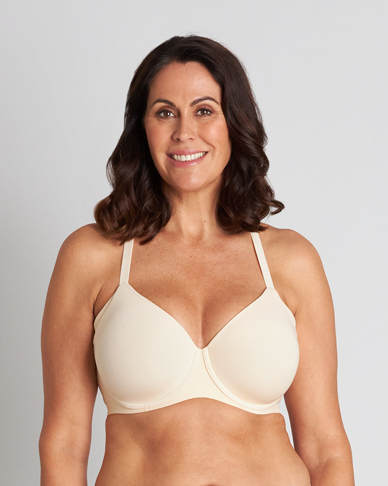 Model wears Comfit Collection Contour Bra in NOVELLE PEACH. On body front view