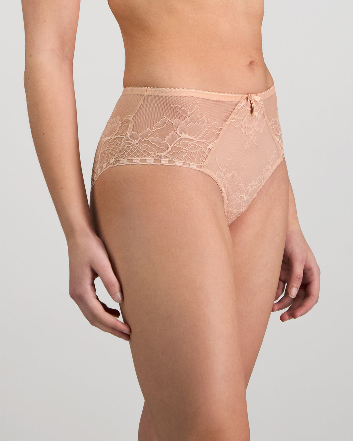 Model wears Golden Hour Full Brief in EVENING SAND. On body side view