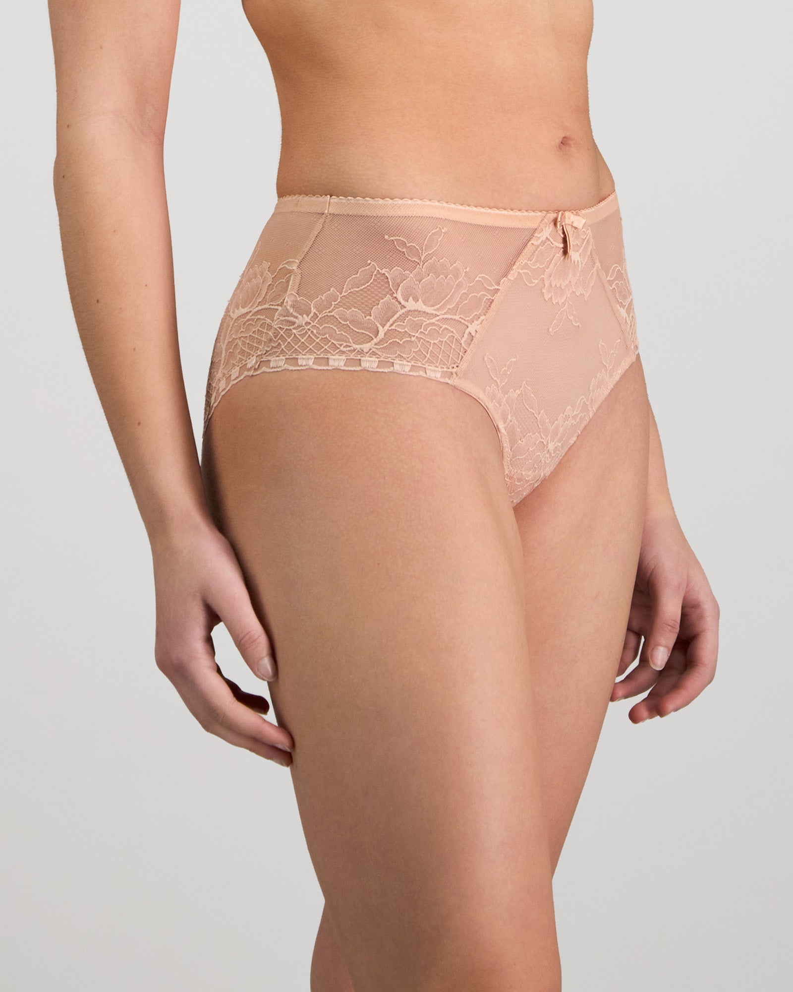 Model wears Golden Hour Full Brief in EVENING SAND. On body side view