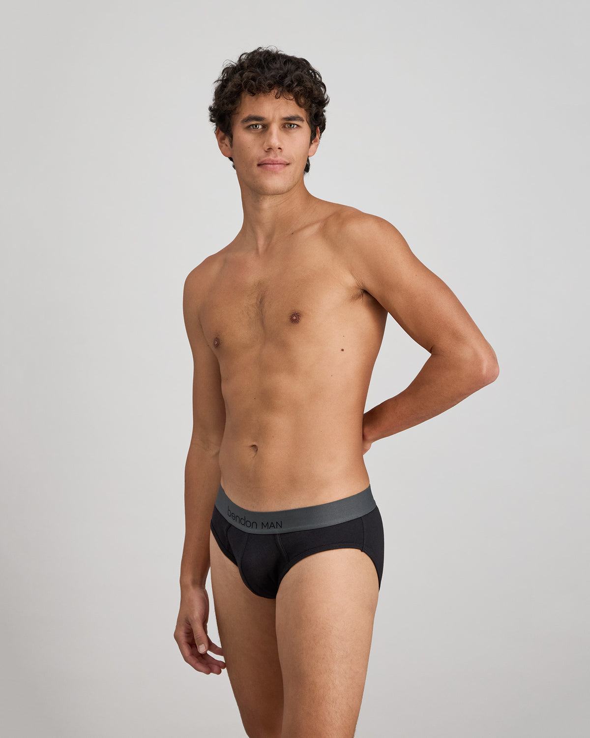 Cotton Low-Rise Mens Brief in BLACK. Flat lay back view