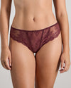 Model wears Sofia Thong in FIG. On body front view