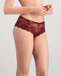 Model wears My Fit Lace Brazilian in WINDSOR WINE. On body side view