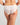 Model wears Alice Midi in WHITE. On body back view
