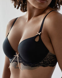 Model wears Keyhole Push Up Bra in BLACK/TOASTED ALMOND. On body side view