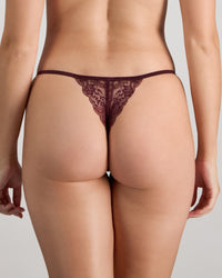 Model wears Etienne Thong in FIG. On body back view