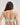 Model wears Yvette Underwire Bra in SKYWAY. On body back view