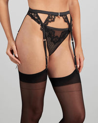 Model wears Bianca Nera Suspender in BLACK. On body side view