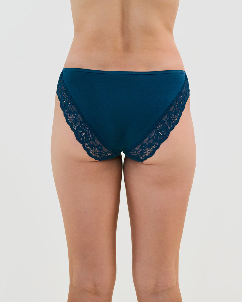 Model wears Cotton And Lace Bikini in REFLECTING POND. On body back view