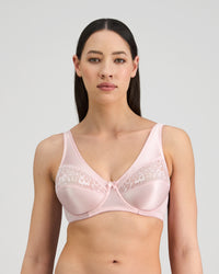 Model wears Classic Underwire Underwire Bra in PALE LILAC. On body front view