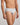 Model wears Bamboo Mens Brief in GREY MARLE. On body side view