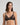 Model wears Ava Rose Underwire Bra in BLACK. On body front view