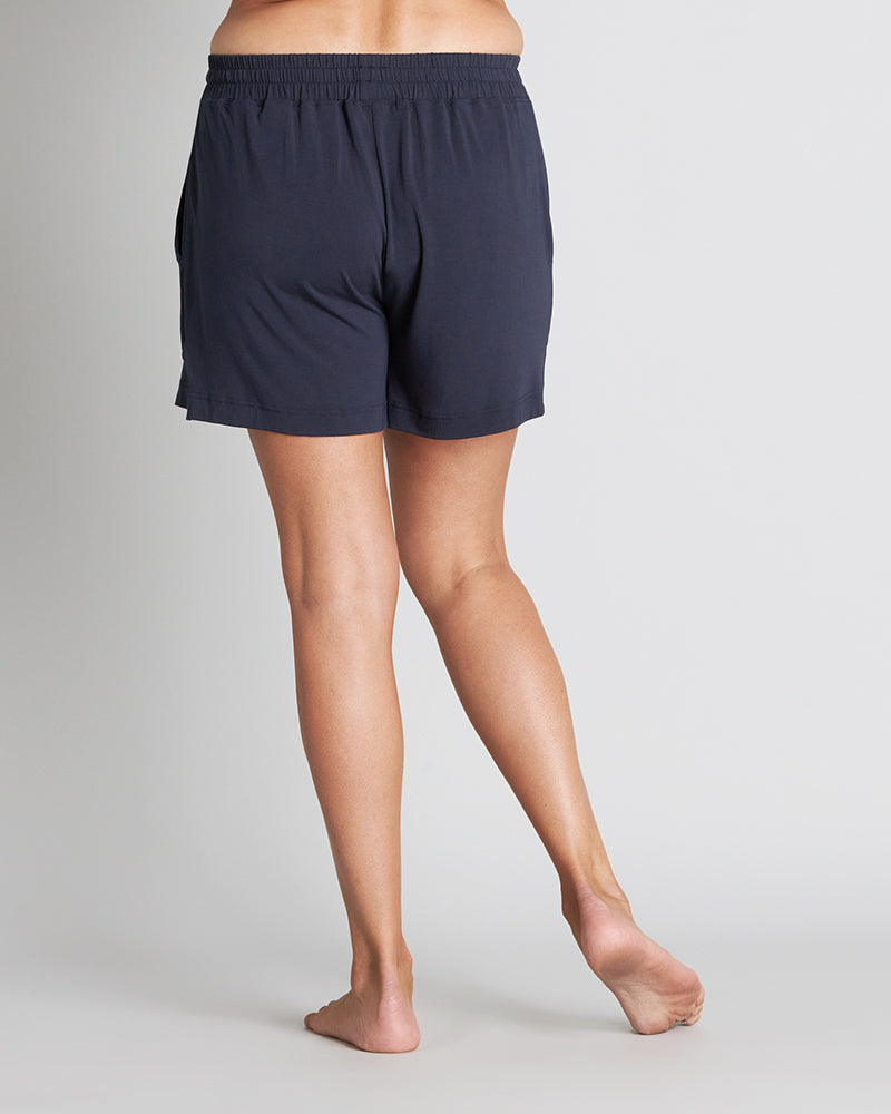Model wears Sleep-Talk Short in NIGHT SKY. On body back view