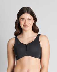 Model wears Motion Wire Free Front Opening Bra in BLACK. On body front view