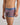 Model wears Bold Stripe Mens Trunk in INDIGO/FIG STRIPE. On body side view