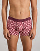 Model wears Retros Print Mens Trunk in ART TILE PRINT. On body front view