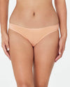 Model wears Clemence Bikini in LATTE. On body front view