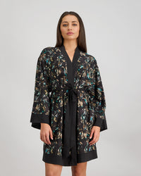 Model wears Lost Paradise Robe in BLACK PRINT. On body side view