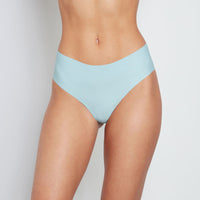Model wears No Show Bikini in ETHER. On body front view