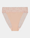 Model wears Lace Trim High Cut Brief in LATTE. On body front view