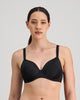 Model wears Rita Contour Bra in BLACK. On body front view
