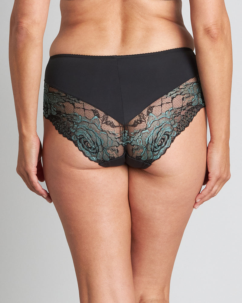 Model wears Eloquence Full Brief in BLACK/DEEP LAKE. On body back view